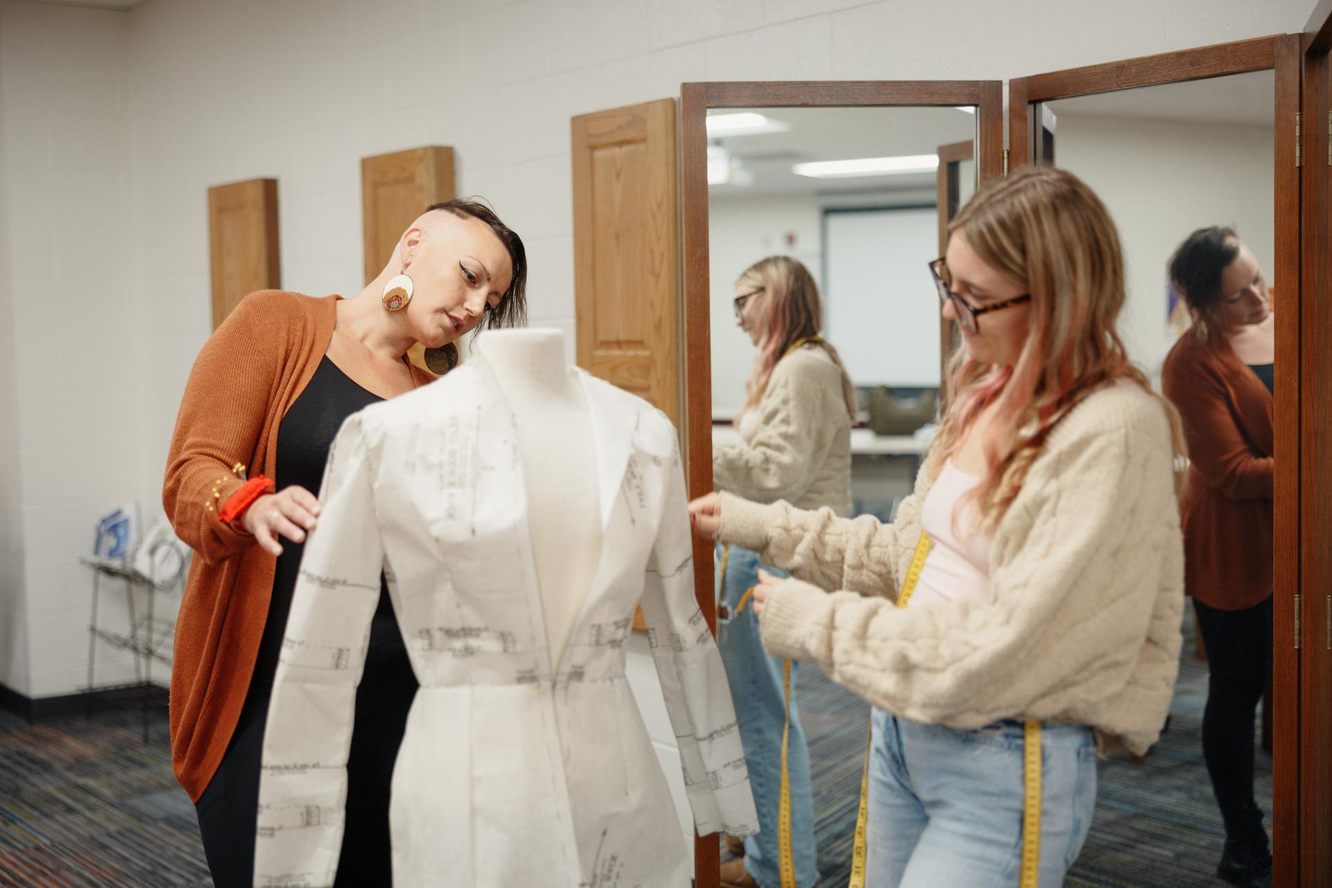 hum/Vincennes-University-Shircliff-Humanities-Center-Fashion-Students-Fixing-Up-an-Outfit-on-a-Mannequin-alt